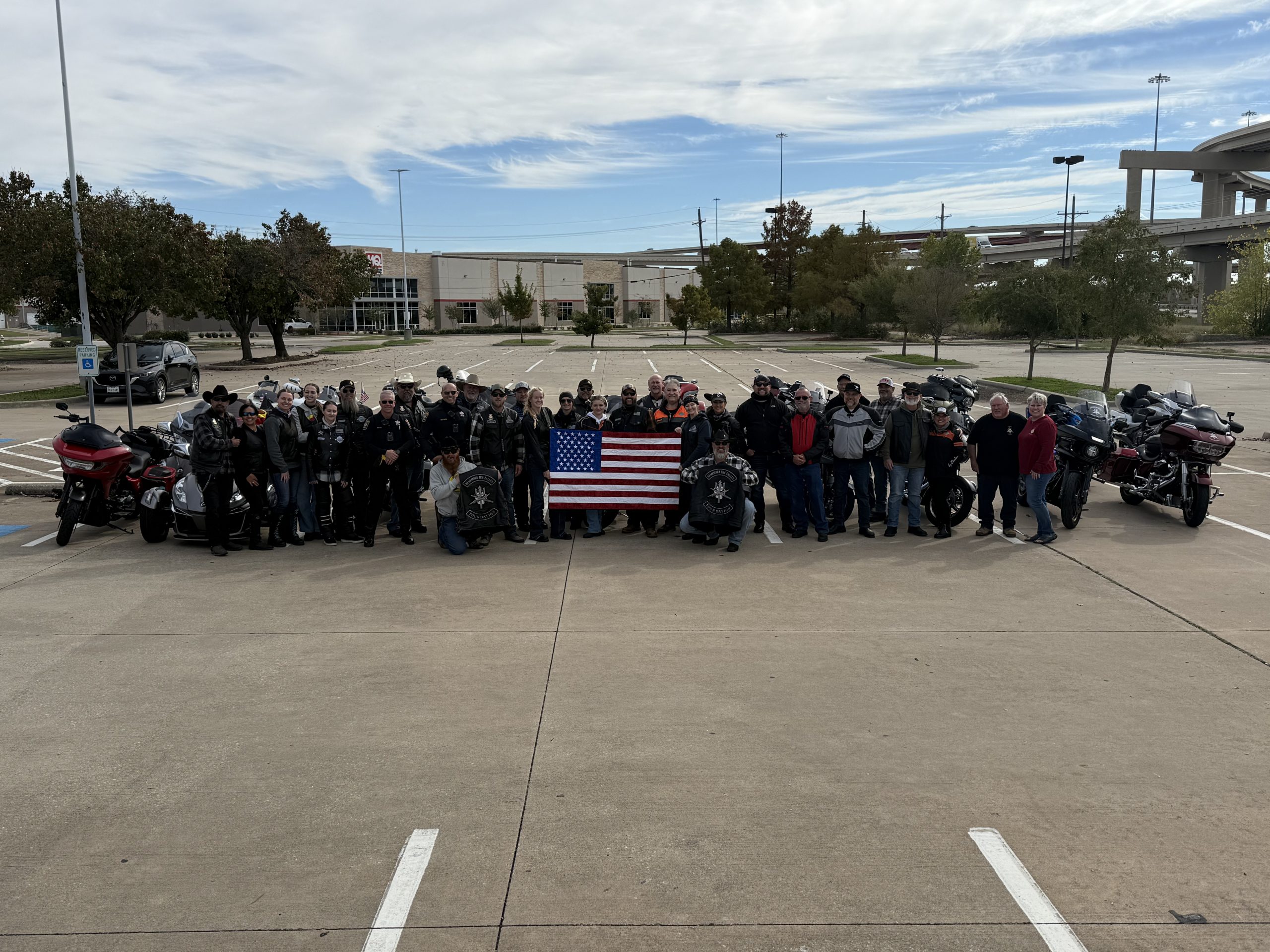 Veterans honoring fallen heroes at a military cemetery